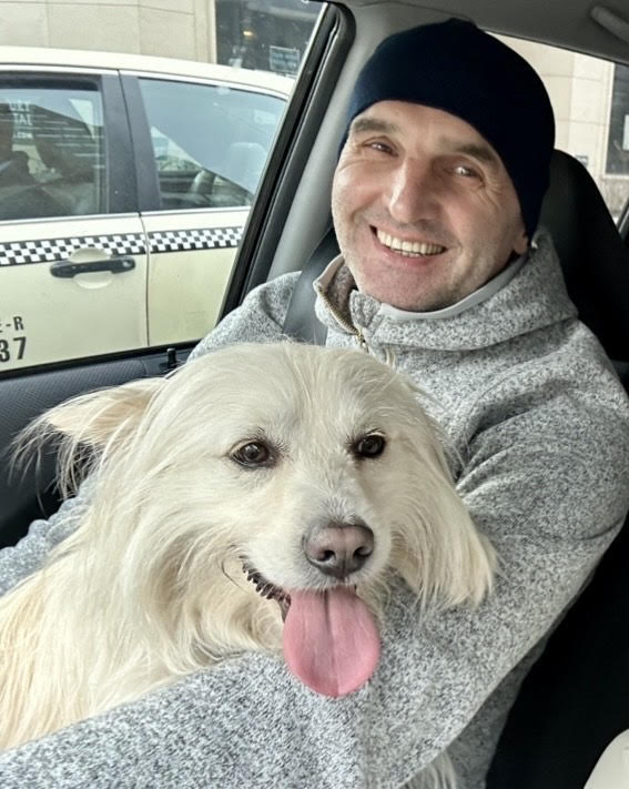 Serhii, with a dog